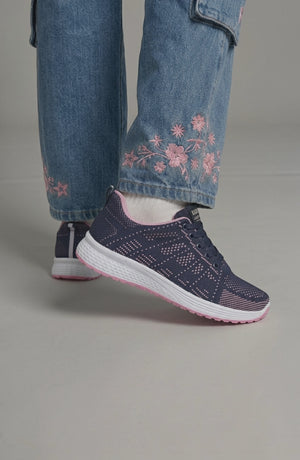 LORVENE Pure Storm sneakers in white with black accents, featuring a sleek design and comfortable athletic style.
