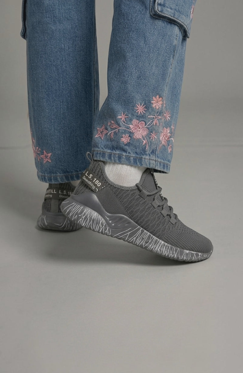LORVENE Chrome Path sneakers shown in a top right pose, featuring sleek chrome accents and a modern athletic design.