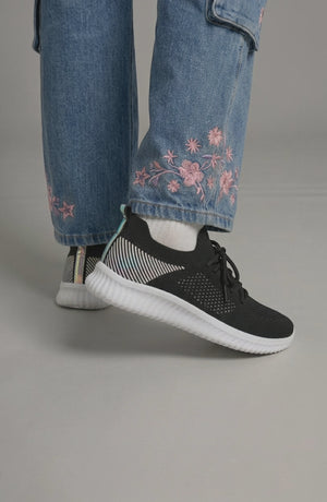 LORVENE Polar Crest sneakers in white with gray accents, showing the side view of sporty athletic shoes with laces and textured soles.