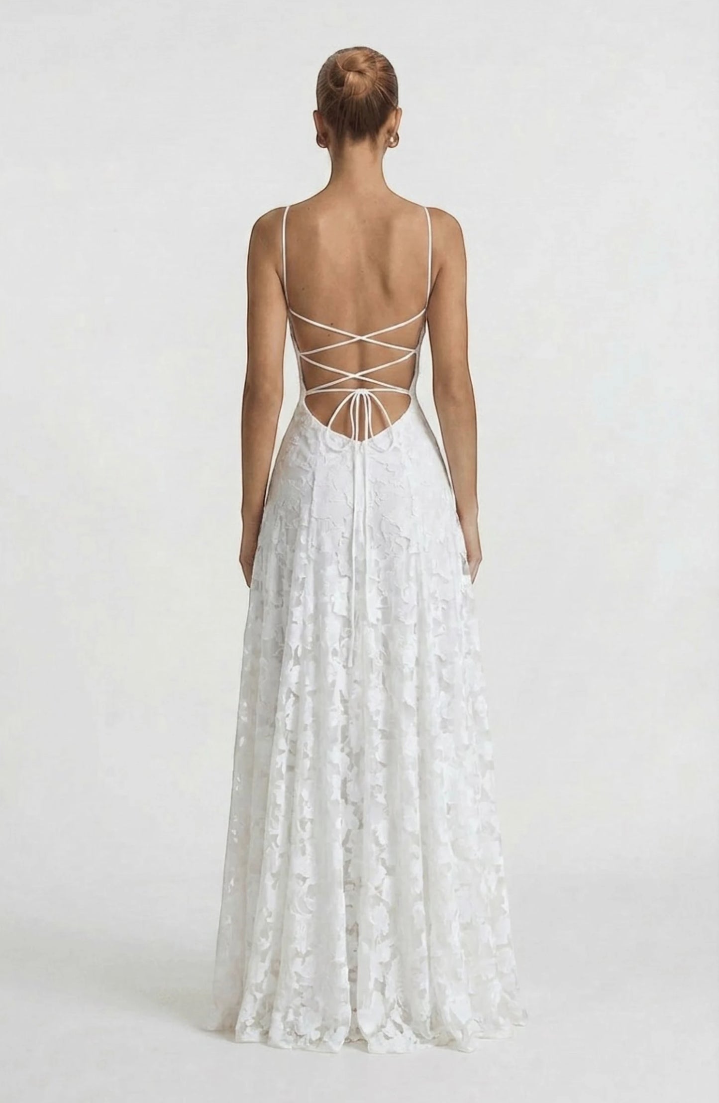 LORVENES sexy flowy bridal dress with elegant, lightweight fabric and intricate details, perfect for a romantic wedding look