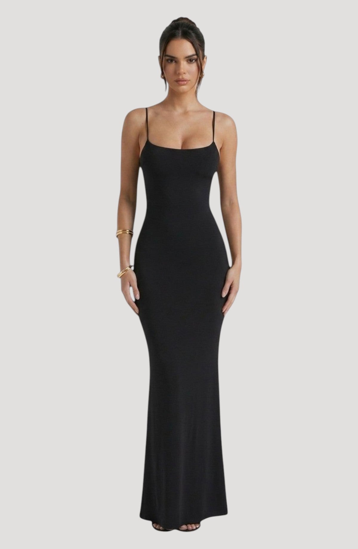 LORVENE black slip dress with spaghetti straps and a square neckline, midi length, made from smooth fabric with a sheen.