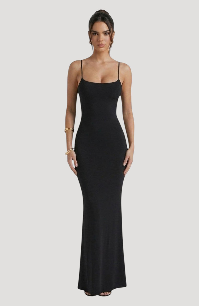 LORVENE black slip dress with spaghetti straps and a square neckline, midi length, made from smooth fabric with a sheen.
