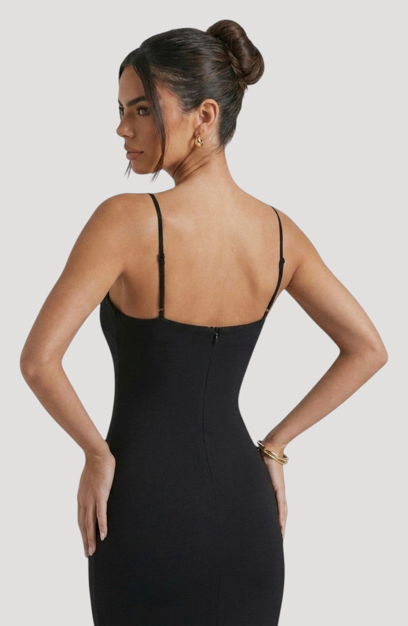 LORVENE black slip dress with spaghetti straps and a flattering fit, designed for evening wear.