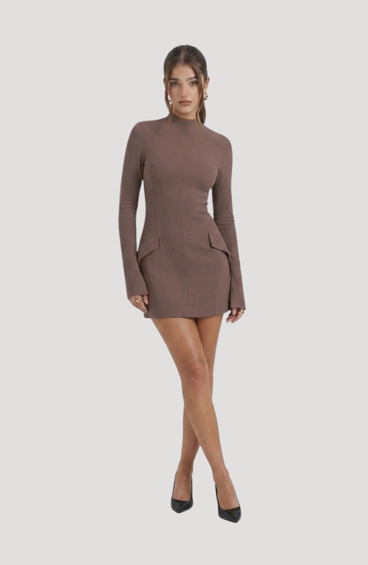 LORVENES brown long-sleeve mini dress with mock neck and flap pockets. Model wears black heels.