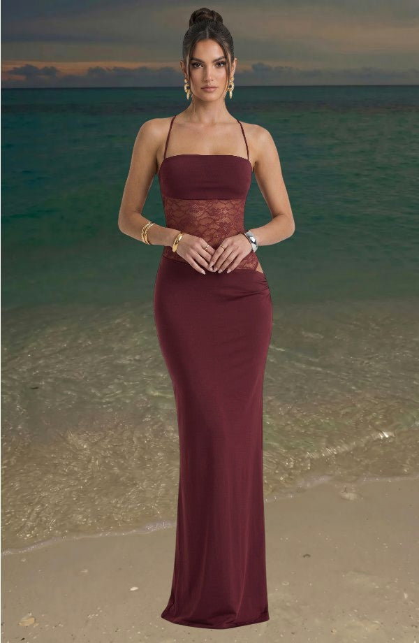 LORVENES burgundy maxi dress with lace midriff detail and spaghetti straps. Model wears gold jewelry.
