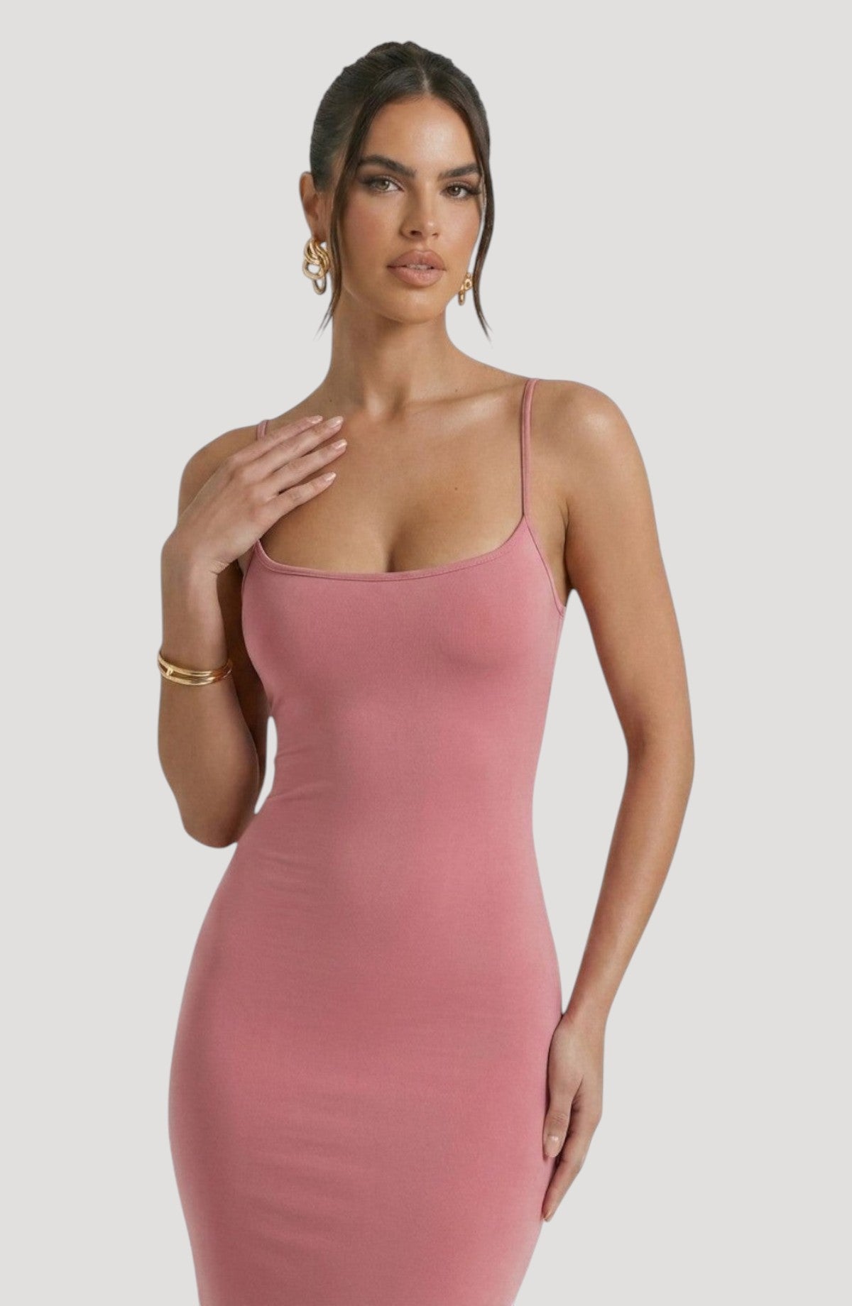 LORVENE Bold Shine Dress in dusty rose, a sleek midi dress with spaghetti straps and a flattering fit, perfect for evening wear.
