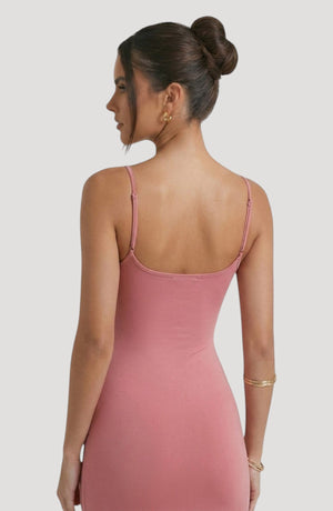 LORVENE Bold Shine Dress in dusty rose, a sleek, body-hugging midi dress with spaghetti straps and a subtle sheen.
