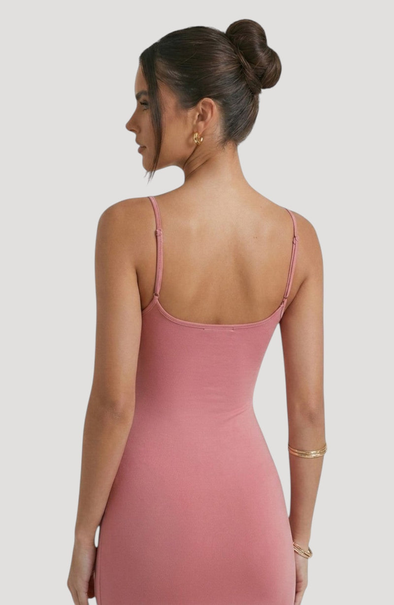 LORVENE Bold Shine Dress in dusty rose, a sleek, body-hugging midi dress with spaghetti straps and a subtle sheen.