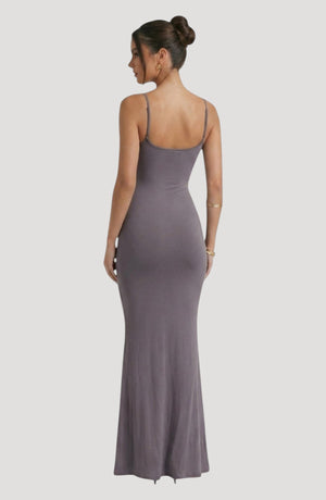 LORVENE grey slip dress with spaghetti straps and a flattering, body-hugging silhouette. Midi length.