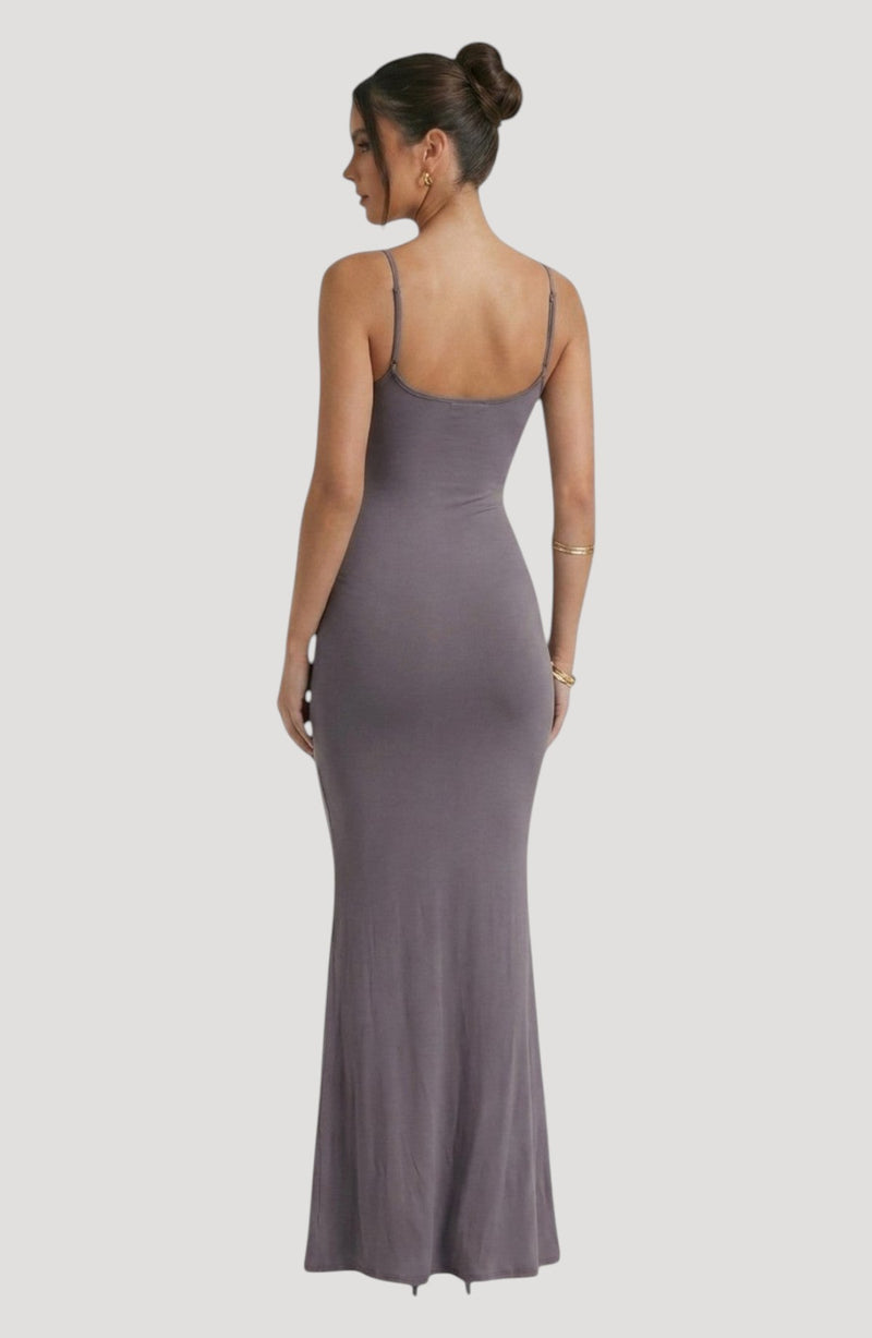 LORVENE grey slip dress with spaghetti straps and a flattering, body-hugging silhouette. Midi length.