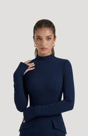 LORVENES navy blue long-sleeve mock neck party dress with thumbhole cuffs and pocket details.
