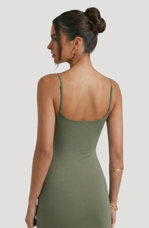 LORVENES olive green spaghetti strap midi dress with a flattering fit and subtle sheen. Model wears gold jewelry.