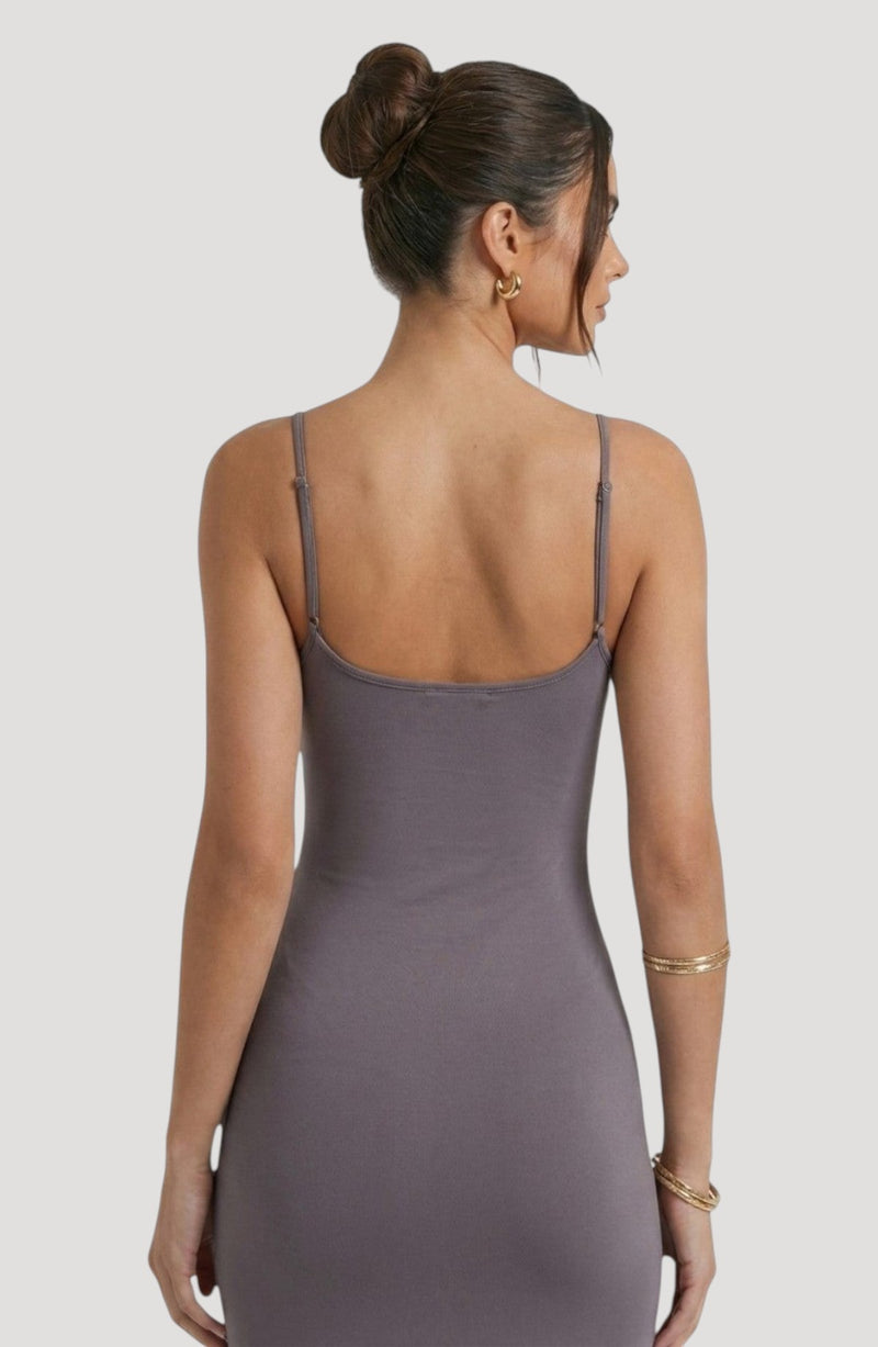 LORVENE Bold Shine Dress in taupe, a sleek, body-hugging mini dress with thin adjustable straps and a subtle sheen.