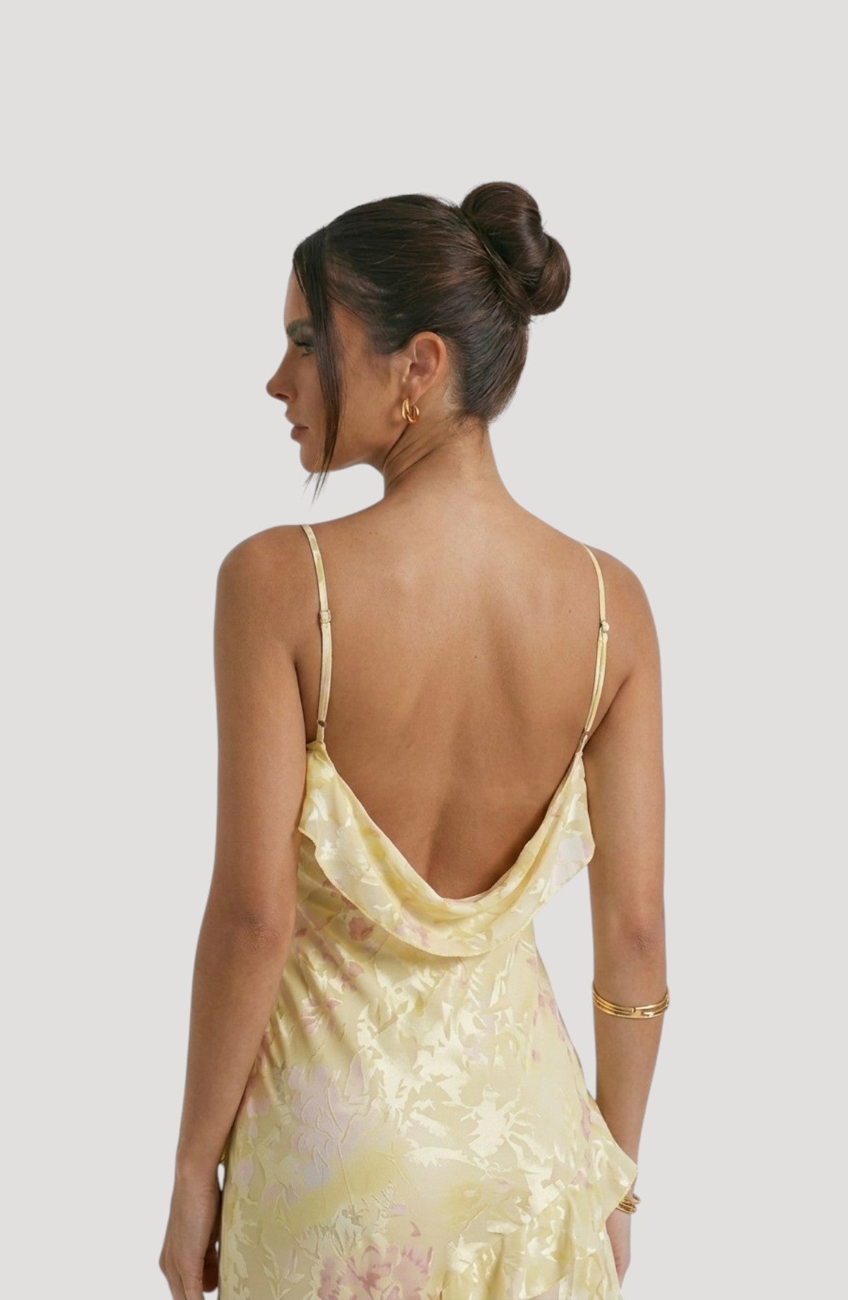 LORVENES yellow satin floral print slip dress with cowl neck and adjustable straps.