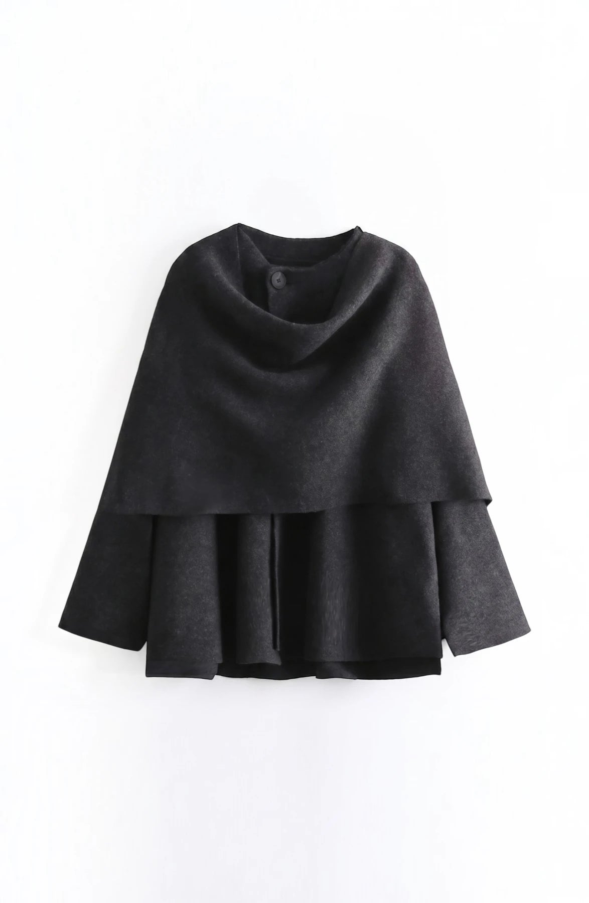 LORVENE cozy blanket shawl draped over a sofa, soft textured fabric in warm neutral tones, perfect for chilly evenings.