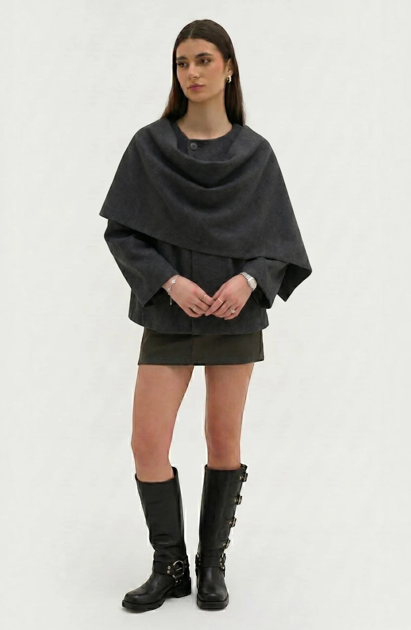 LORVENE Cozy Blanket Shawl draped over a chair, showcasing soft fabric and warm, comfortable design for cozy lounging.