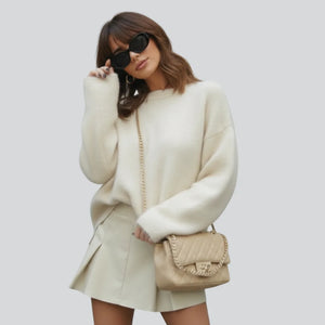 LORVENE textured knit pullover in cozy, patterned fabric with a round neckline and long sleeves on a neutral background.
