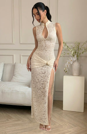 LORVENES Moonlight Glow Dress displayed on a model, featuring a flowing fabric and elegant design for evening wear.