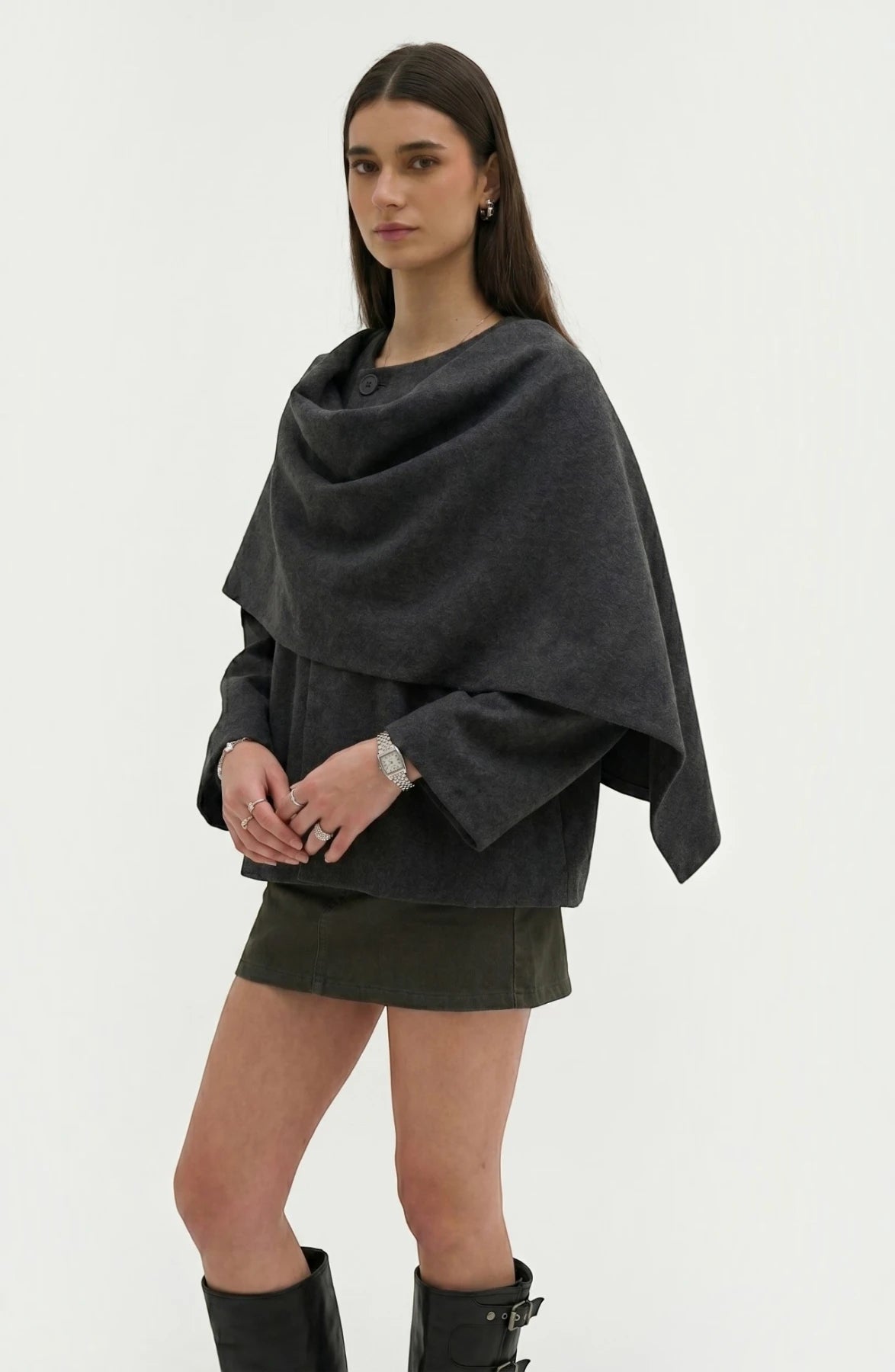 LORVENE cozy blanket shawl draped over a sofa, soft textured fabric in neutral tones for warmth and comfort.