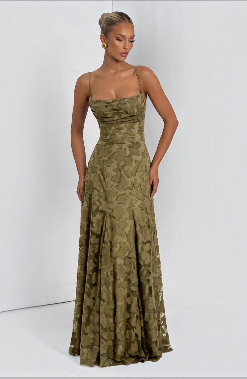 Elegant flowy bridal dress by LORVENES featuring a romantic silhouette and delicate fabric, perfect for a wedding ceremony.