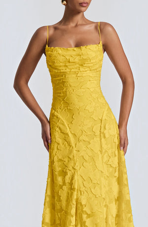 LORVENES sexy flowy bridal dress with elegant fabric, fitted bodice, and flowing skirt, ideal for wedding or special occasion.