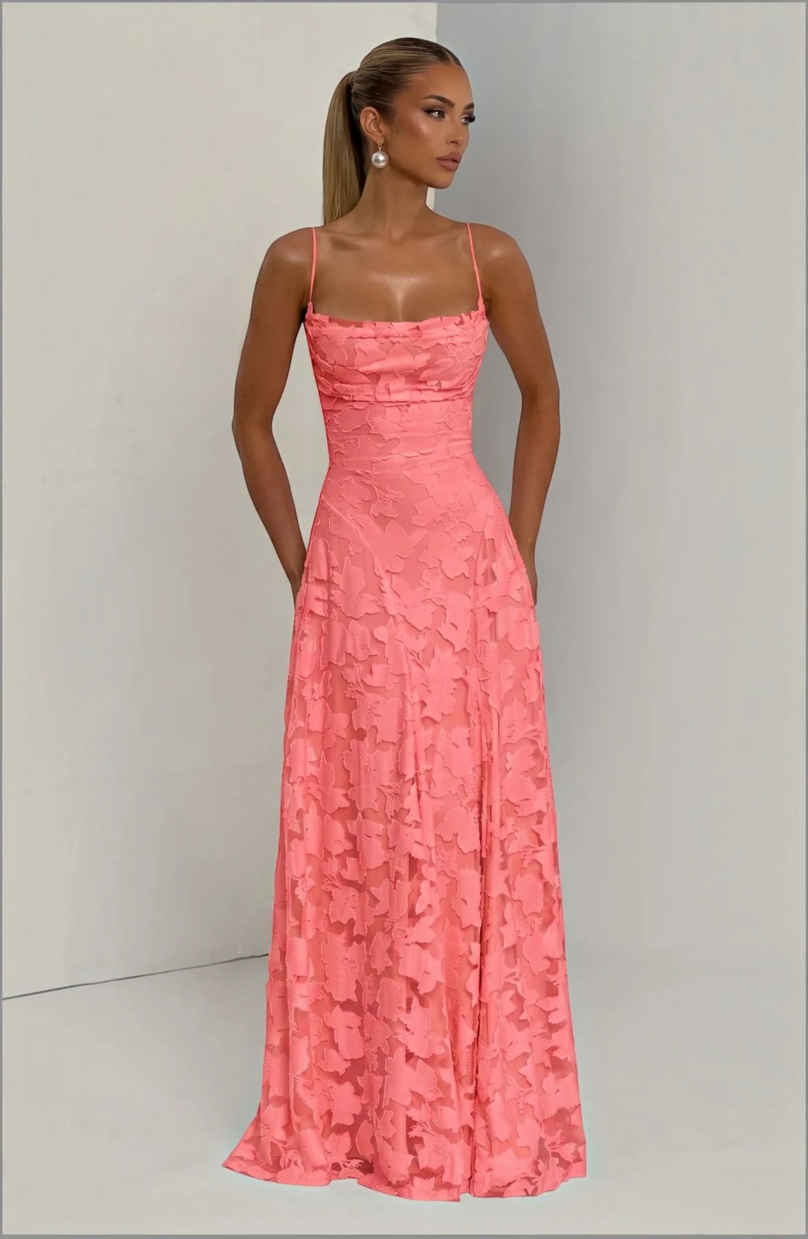 Elegant flowy bridal dress by LORVENES featuring a soft, romantic silhouette and intricate lace details for a wedding look.