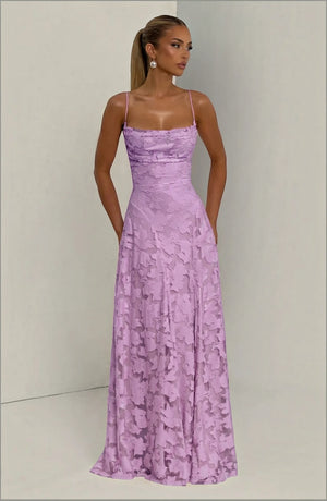 Elegant flowy bridal dress by LORVENES featuring a romantic design with lace details and a graceful silhouette.