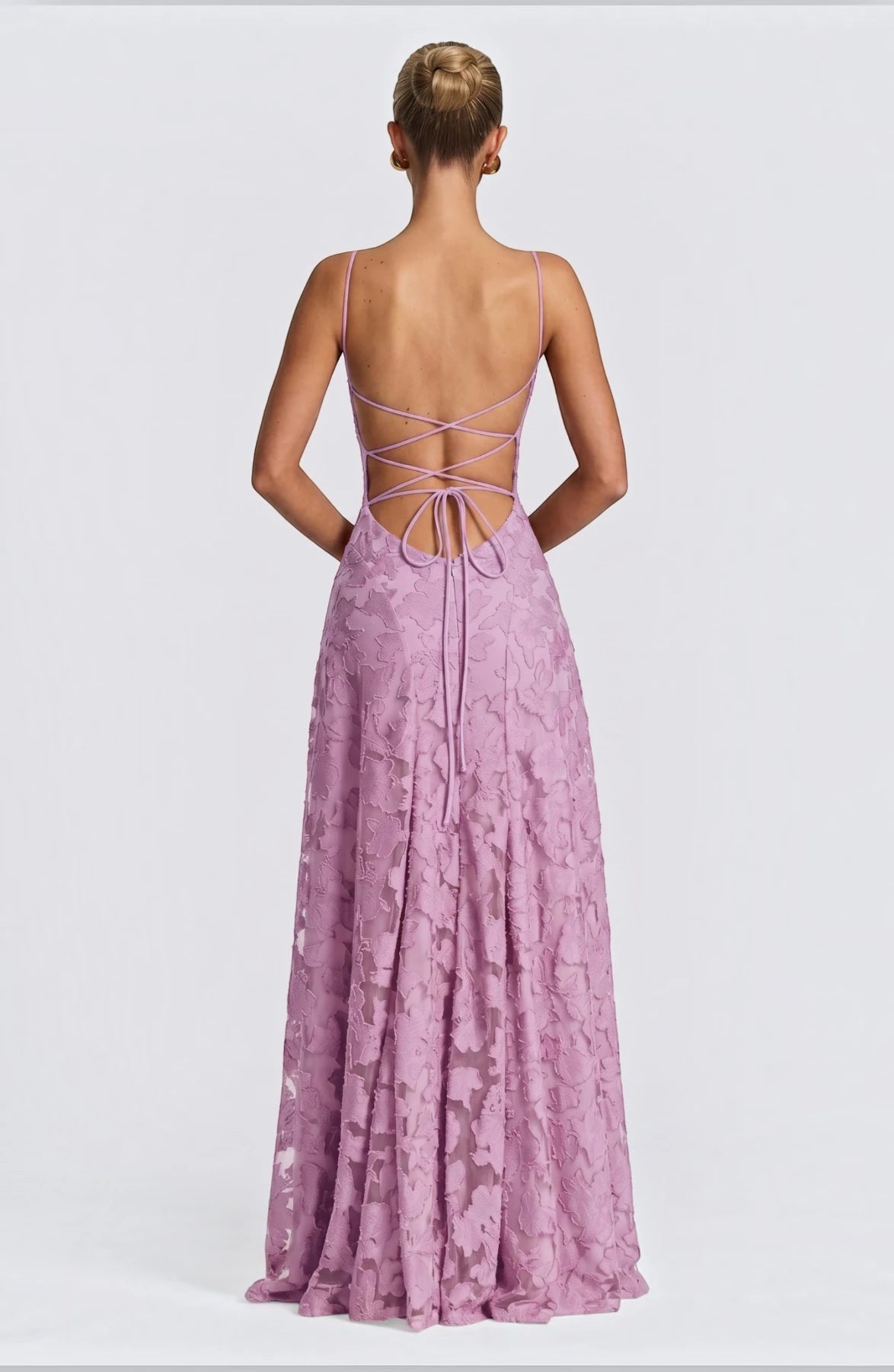 Flowy bridal dress by LORVENES featuring elegant, feminine design with flowing fabric and intricate lace details.