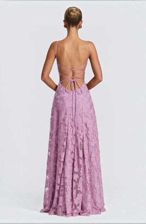 Flowy bridal dress by LORVENES featuring elegant, feminine design with flowing fabric and intricate lace details.