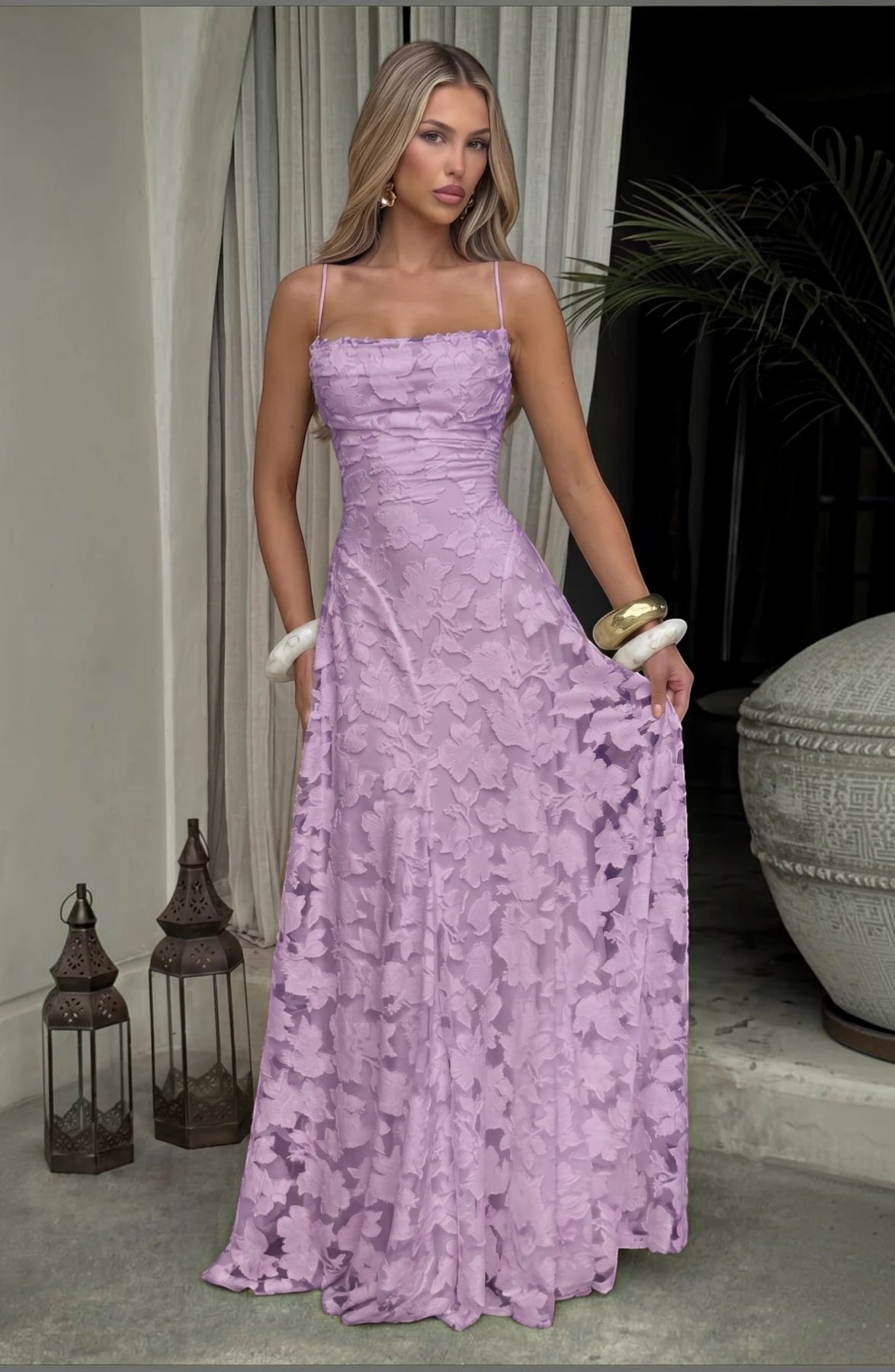 Elegant flowy bridal dress by LORVENES featuring delicate fabric and a flattering fit, perfect for a wedding ceremony.