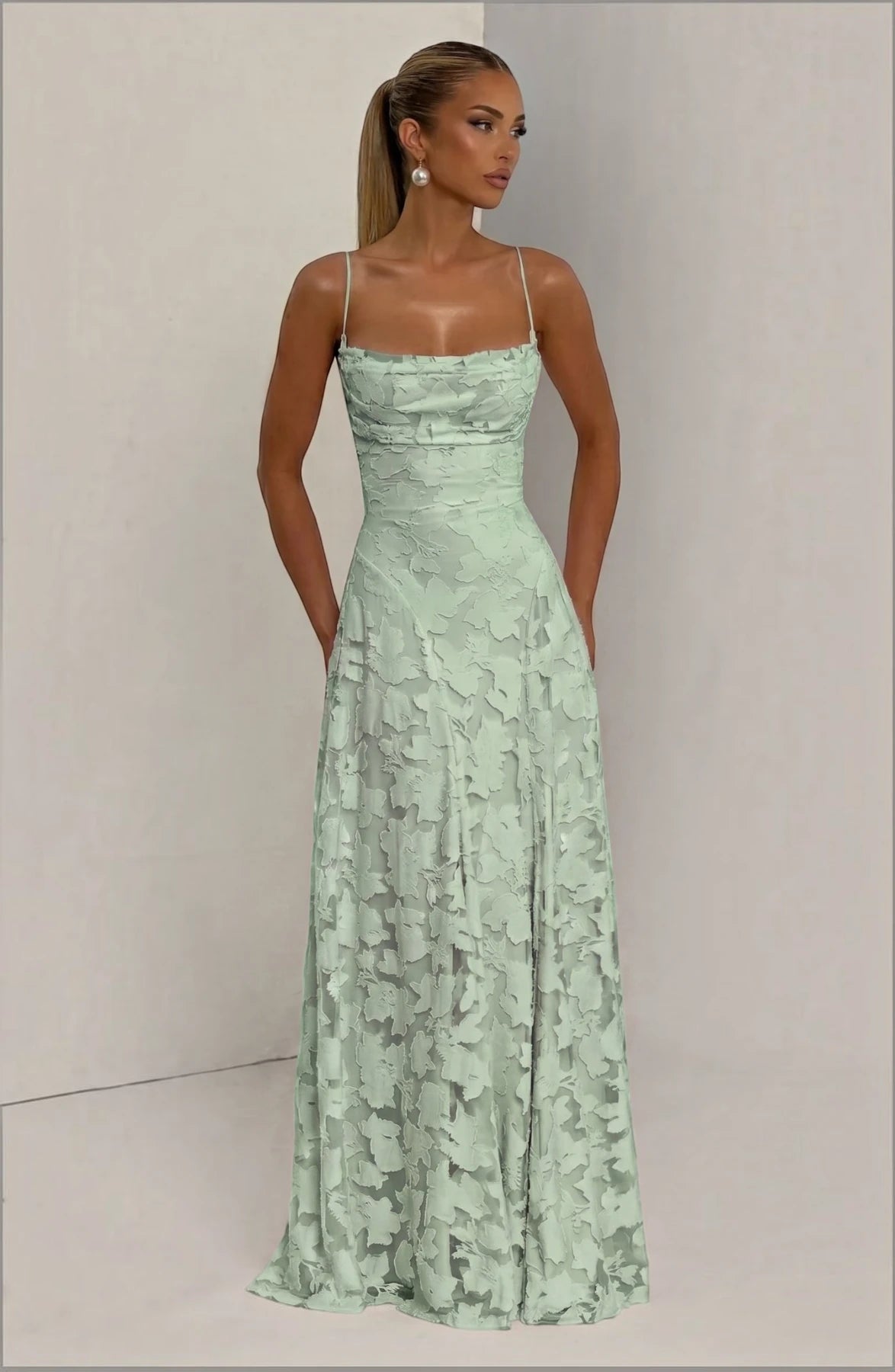 LORVENES sexy flowy bridal dress with elegant fabric and delicate details, perfect for a wedding or special occasion.