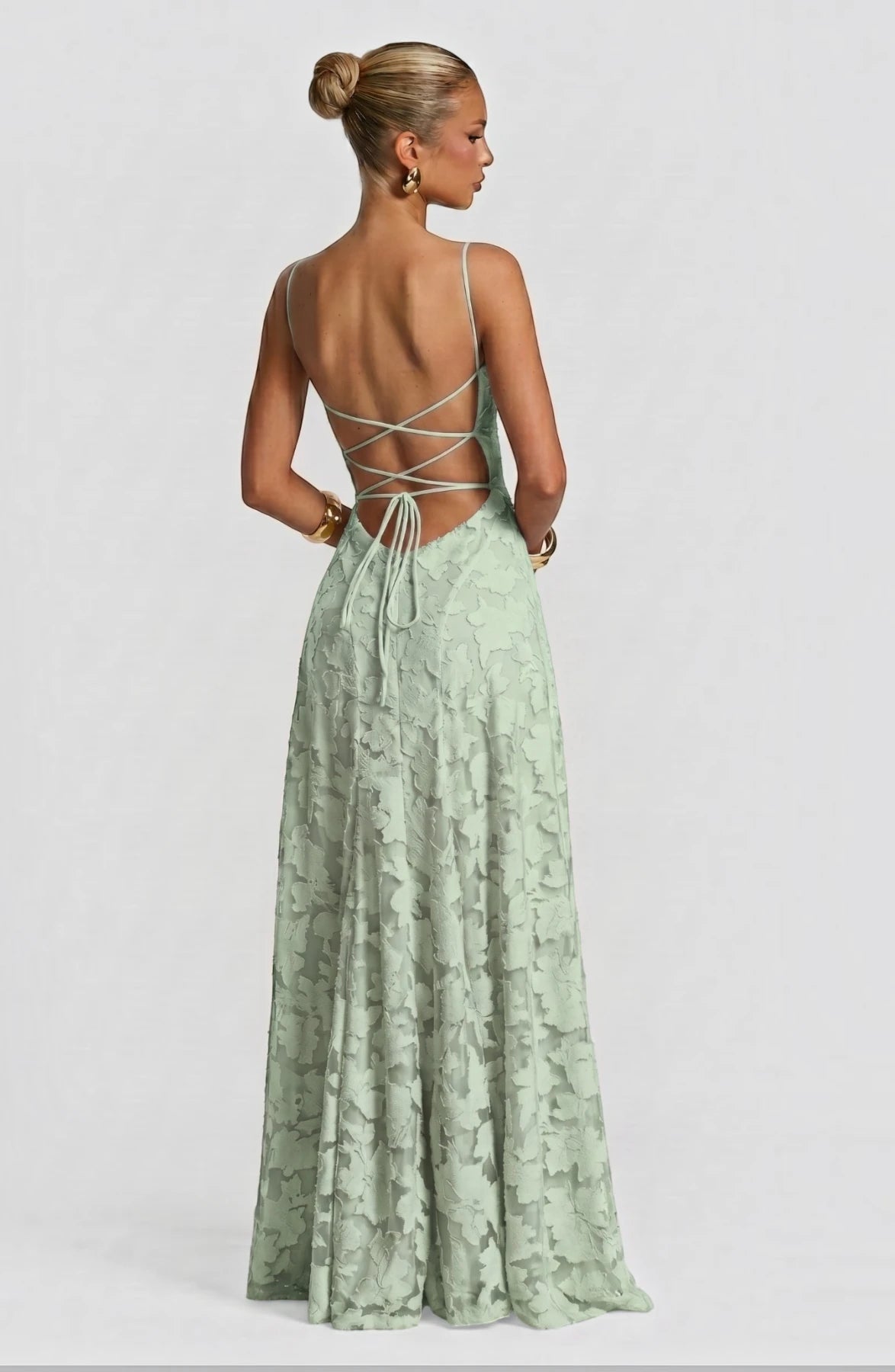 LORVENES sexy flowy bridal dress with elegant fabric and intricate design, perfect for a wedding or special occasion.