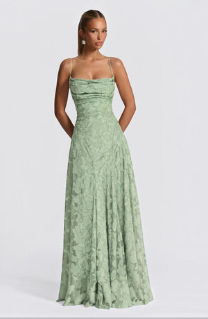 Elegant flowy bridal dress by LORVENES with delicate fabric and romantic silhouette, perfect for a wedding or special occasion.